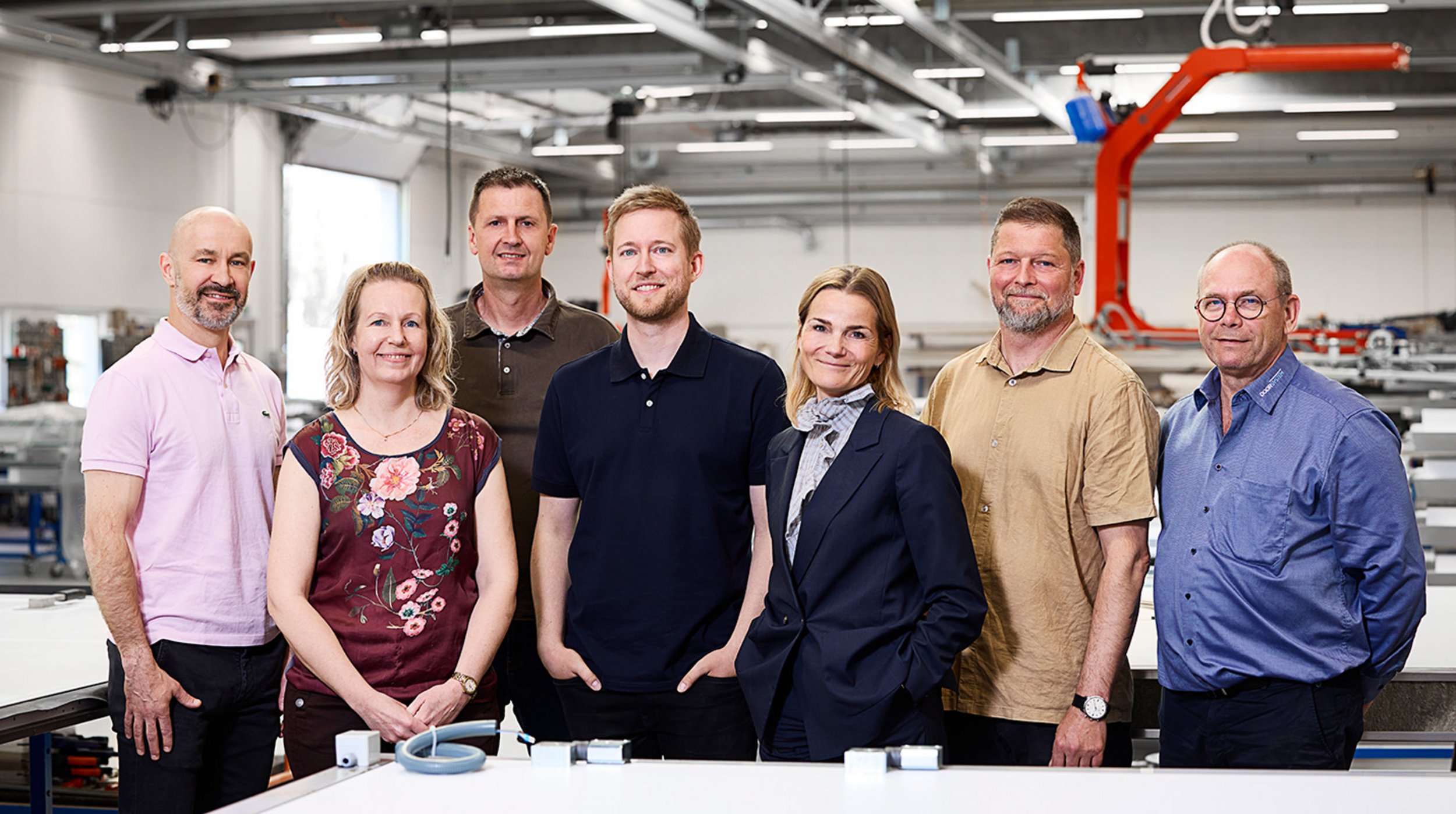 Ledelsesteam fotograferet i produktionen