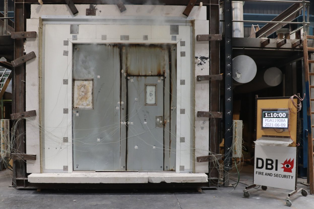 Test of fire sliding door mounted in panel wall
