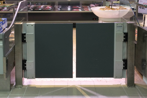 Mini polycarbonate swing door mounted in store